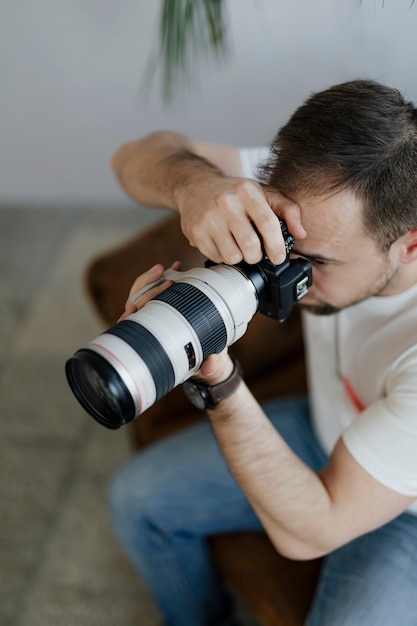 Professional photographer shooting at home