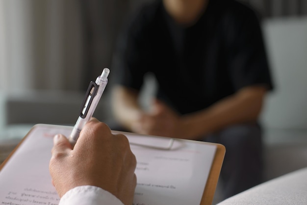 Professional psychologist wearing white shirt conducting a consultation