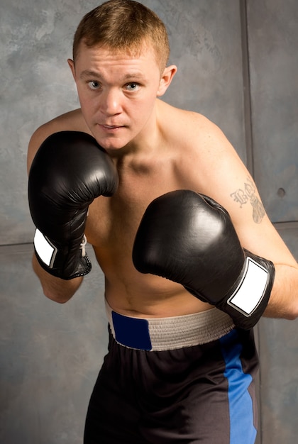 Professional young boxer in a fight