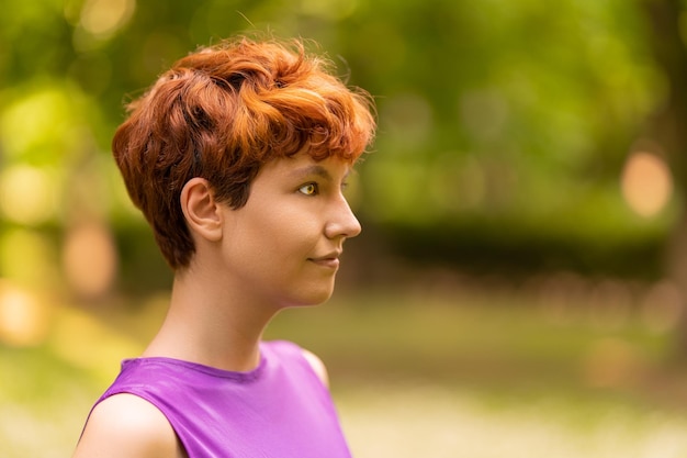 Profile portrait of an android standing in a park