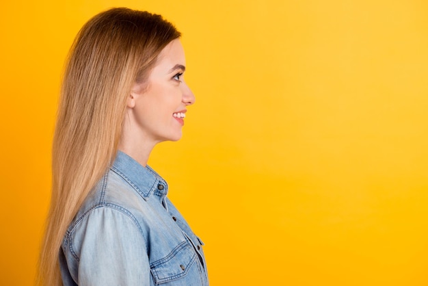 Profile side portrait of nice adorable attractive stunning cheerful girl isolated over vibrant color background