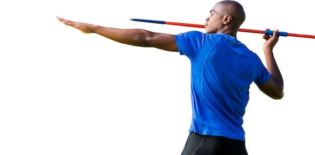 Profile view of sportsman practising javelin throw on a white background