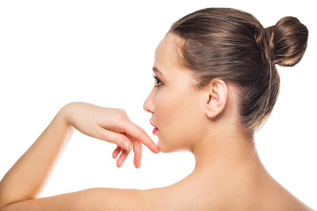 Profile of a Woman from the back. Spa model with clean skin on white isolated background