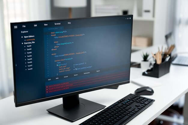 Program coding showing on pc monitor standing on desk working Postulate