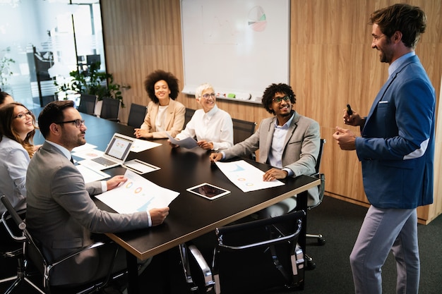 Programmers working in a software developing company office