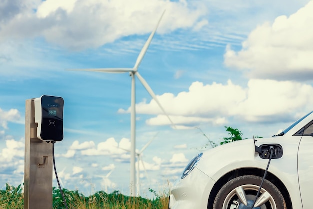 Progressive combination of EV car charging station and wind turbine