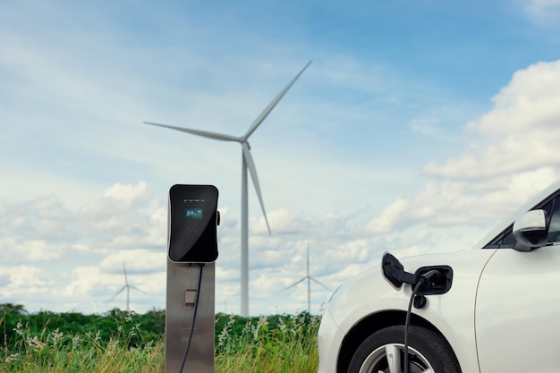 Progressive combination of EV car charging station and wind turbine