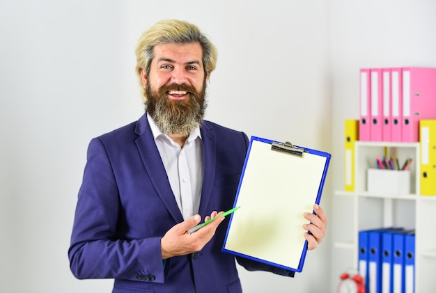 Project Curator Supervisor inspector controlling Business people concept Bearded man making notes Confident businessman holding documents Businessman with folder Control and inspection