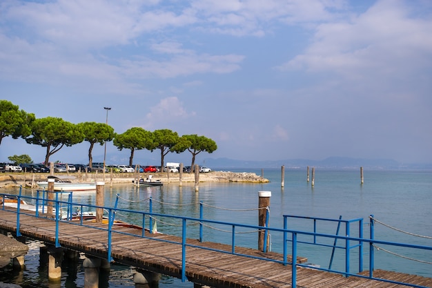 The promenade and pier in Sirmione on Lake GardaTuscany