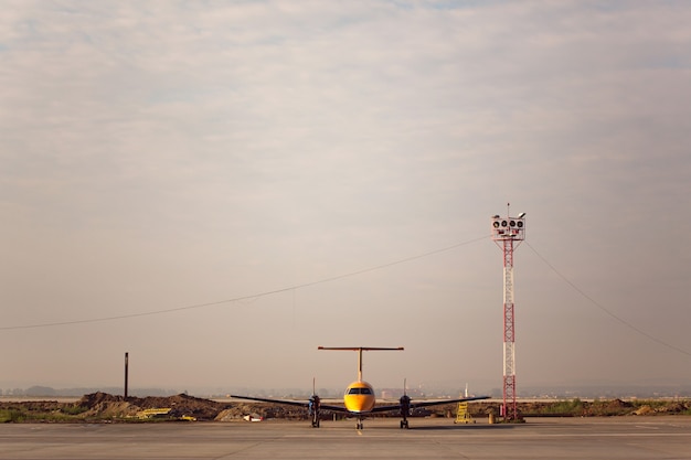 Propeller aircraft standind in airport ready for flight