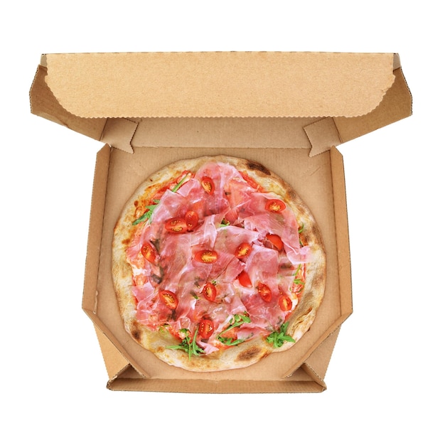 Prosciutto pizza in brown corrugated fiberboard takeout box isolated on white background