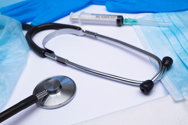 Protective mask, nitrile gloves and stethoscope. Set of doctor.