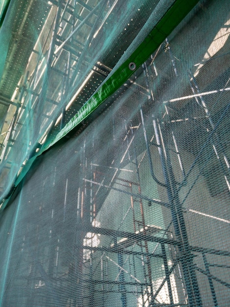 Protective net is covering around the monorail station under construction