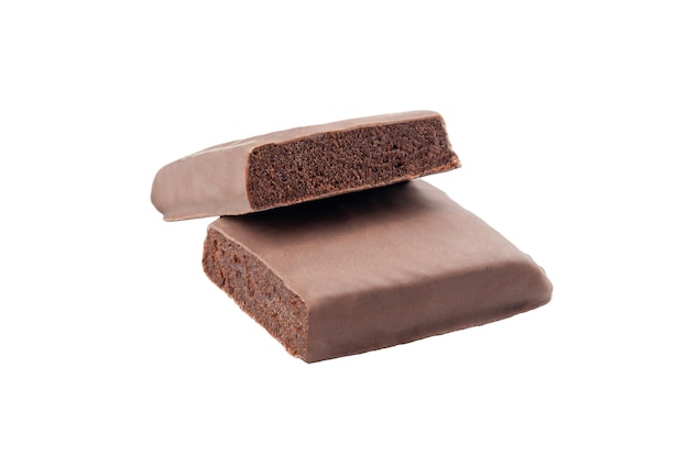 Protein bar with milk chocolate glaze Chocolate cheesecake flavor Cut into two pieces Closeup White background Isolated