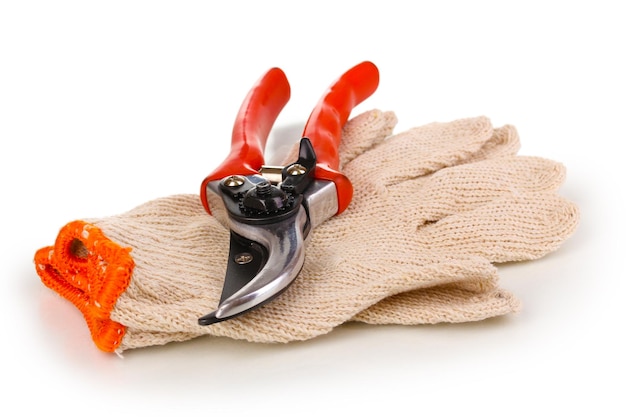 Pruner on garden gloves isolated on white