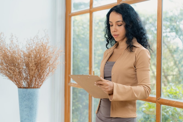 Psychologist woman in clinic office professional portrait with friendly smile feeling inviting for patient to visit the psychologist The experienced and confident psychologist is crucial specialist