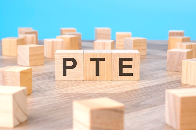 PTE text as symbol on cube wooden blocks