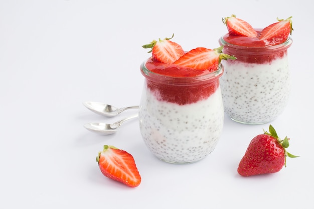 Pudding with chia and  strawberry in glass jars