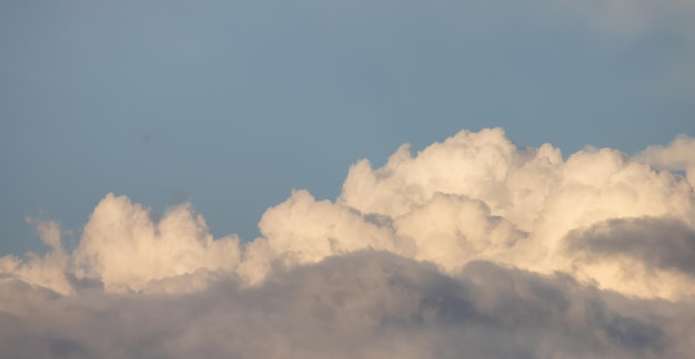 Puff clouds in the sky during sunset