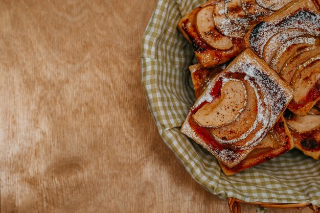 Puff pastry puffs with Apple, cinnamon and powdered sugar