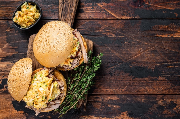 Pulled pork burger with bbq sauce and coleslaw salad