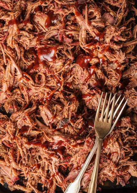 Pulled pork Slow cooked pulled pork shoulder Juicy pork meat cooked in a smoker by low and slow