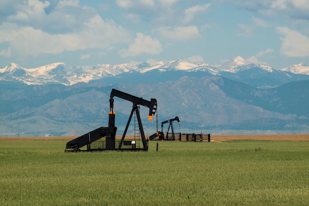 Pumpjack on agricultural field in Colorado.