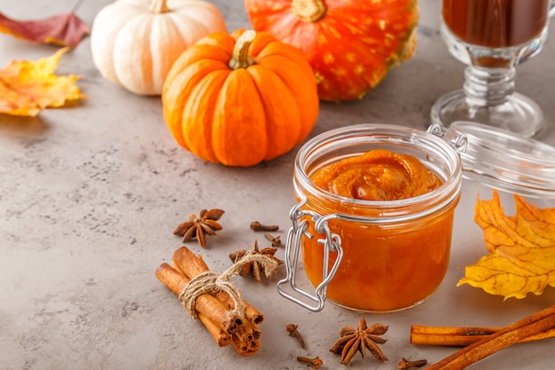 Pumpkin butter with cinnamon in a glass jar