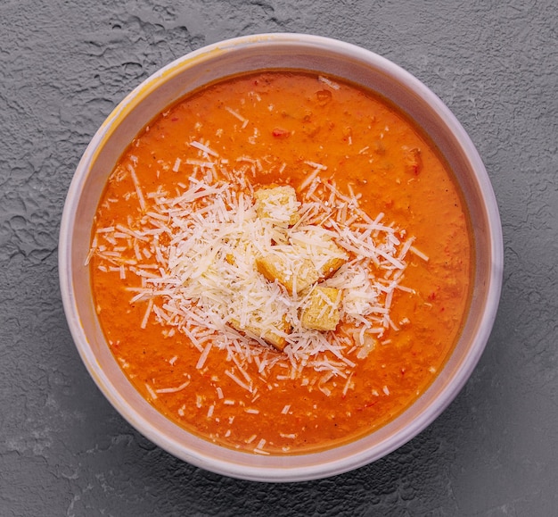 Pumpkin carrot cream soup with parmesan