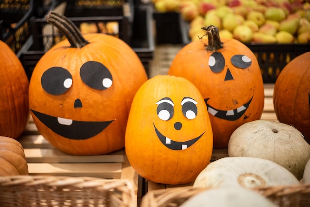 Pumpkin faces on the store counter Halloween