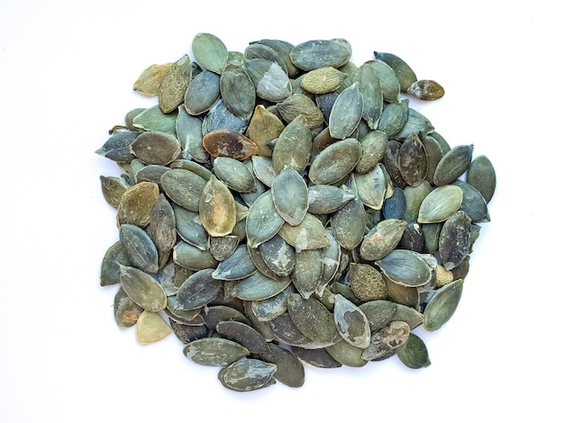 Pumpkin seeds isolated on a white background. Photography pumpkin seeds.