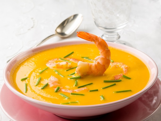 Pumpkin soup with shrimp and chive