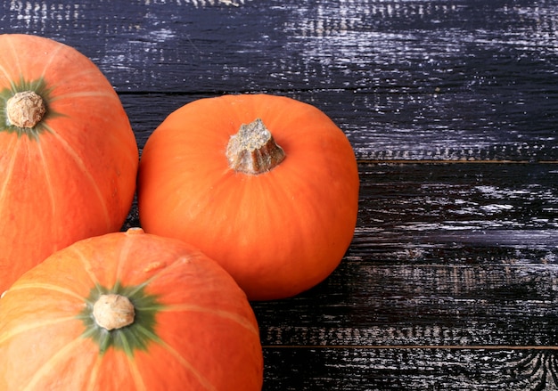 Pumpkins on the old wooden table rustic style