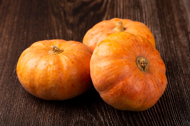 Pumpkins on the wooden table