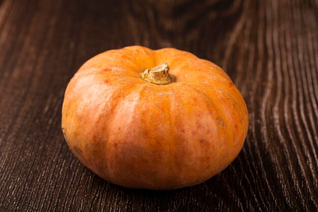 Pumpkins on the wooden table