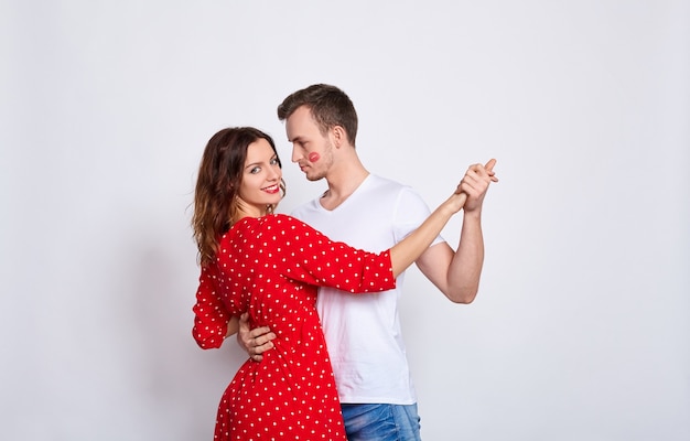 Pure temptation. Young beautiful couple in beautiful elegant clothes