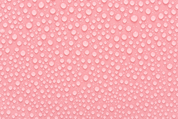 Pure water drops on pink abstract background or texture.