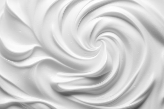 Pure white cream texture smooth creamy cosmetic product backgroundwhite foam cream texture for backdrop