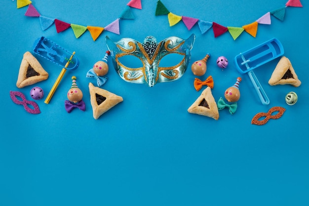 Purim celebration concept jewish carnival background hamantaschen or hamans ears cookies carnival ma