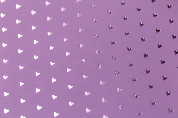 Photo a purple background with hearts that say  hearts