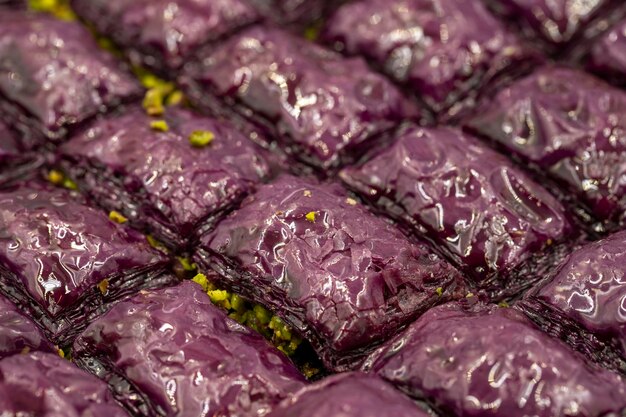 Purple baklava violet baklava It is produced with a mixture called purple mix obtained from the extracts of purple vegetables and fruits Traditional Middle Eastern Flavors Local name Mor Baklava