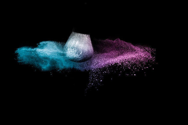 purple and blue ocean cosmetic powder spreading 