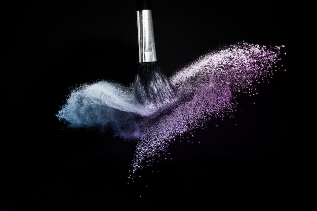 purple and blue ocean cosmetic powder spreading 