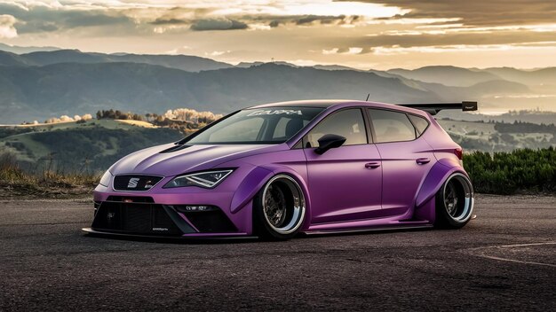 a purple car with the logo on the side is parked on a gravel road