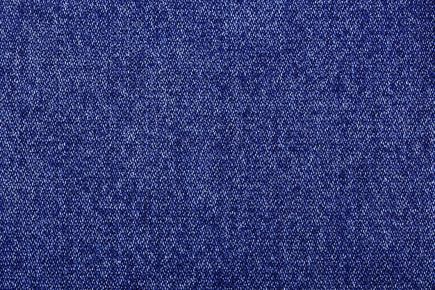 purple color jeans texture factory fabric on white background close up