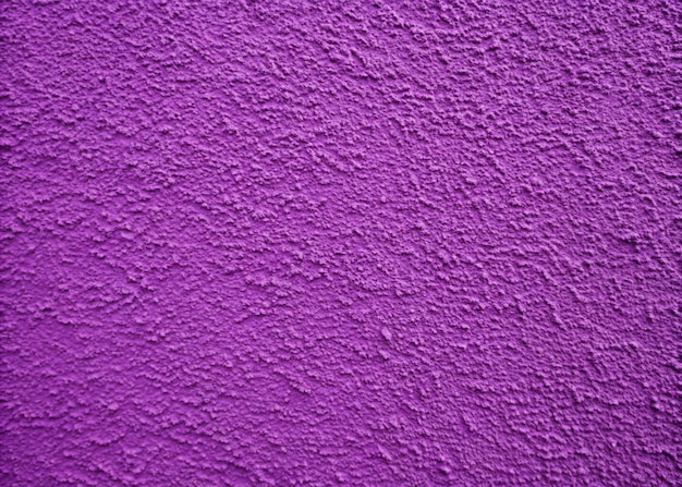 Photo purple color plaster wall background