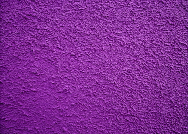 Photo purple color plaster wall background