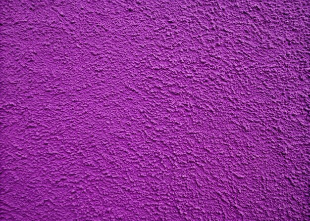 Photo purple color plaster wall background