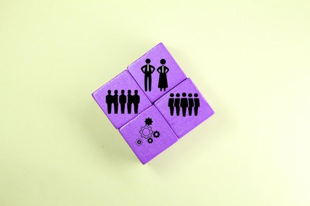 A purple cube with a stick figure on it that says'people'on it