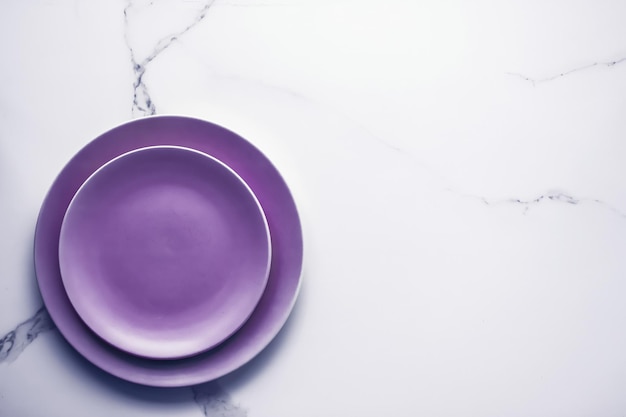 Purple empty plate on marble table background tableware decor for breakfast lunch and dinner for restaurant brand menu recipe luxury holiday flatlay design